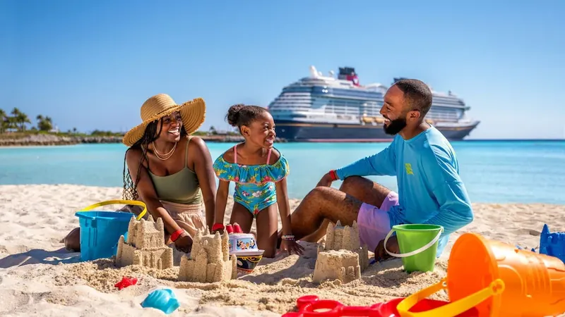 Família faz castelos de areia na praia, com um navio ao fundo